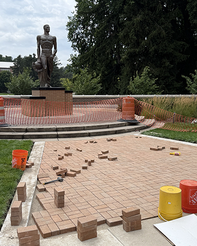 bricks being placed within the new landing