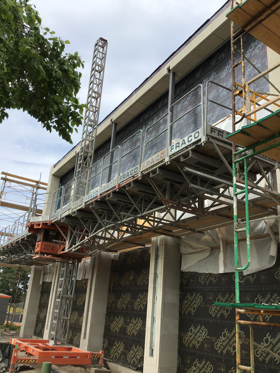 Photo of exterior envelope work at the Duffy Daugherty Building
