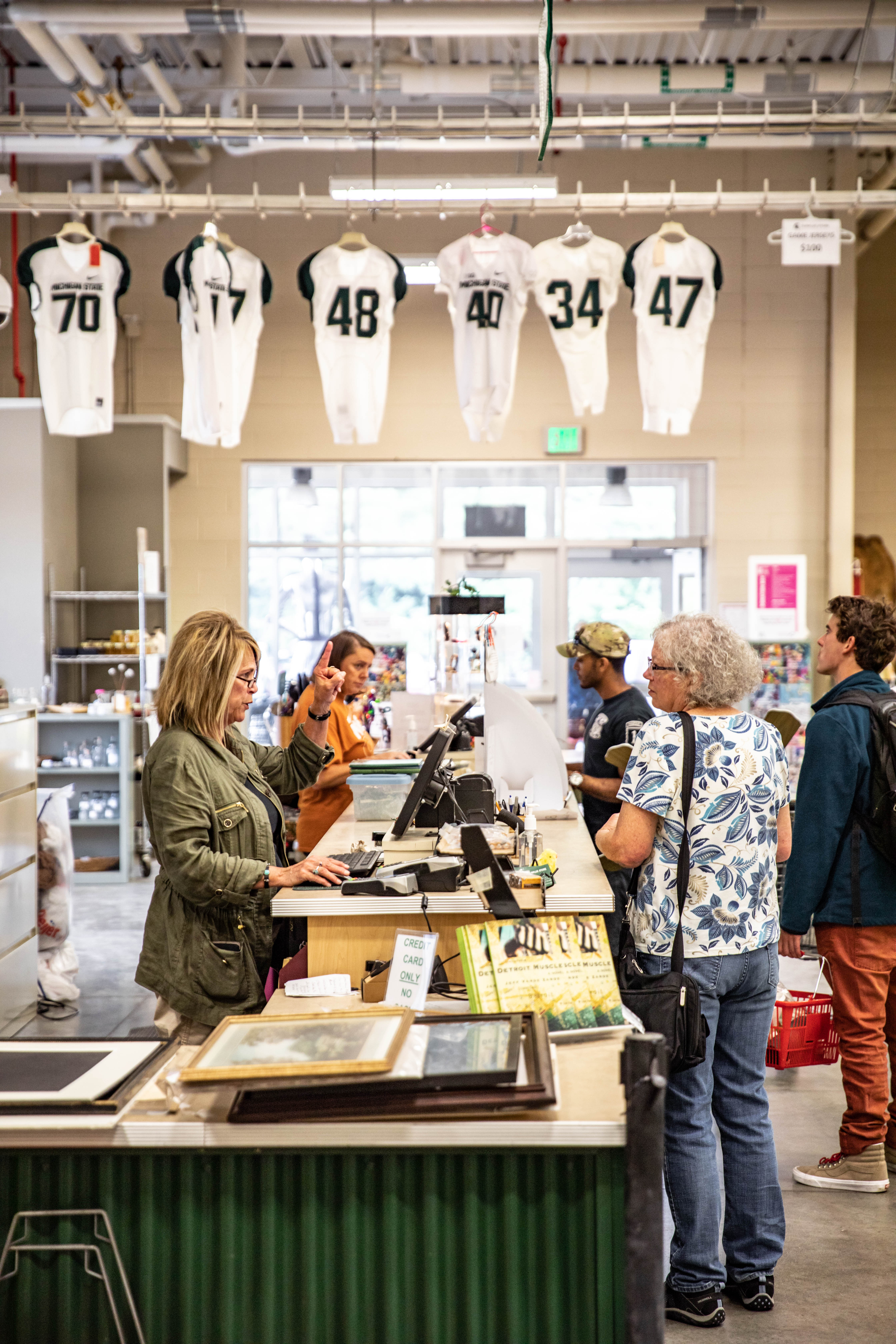 Customers shop at the MSU Surplus Store