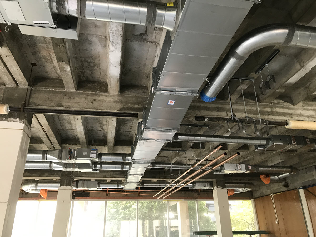 New HVAC ductwork and water distribution piping are being installed in most areas of the facility