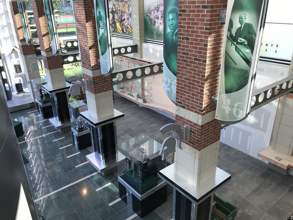 Photo from second floor of new first floor display case installation