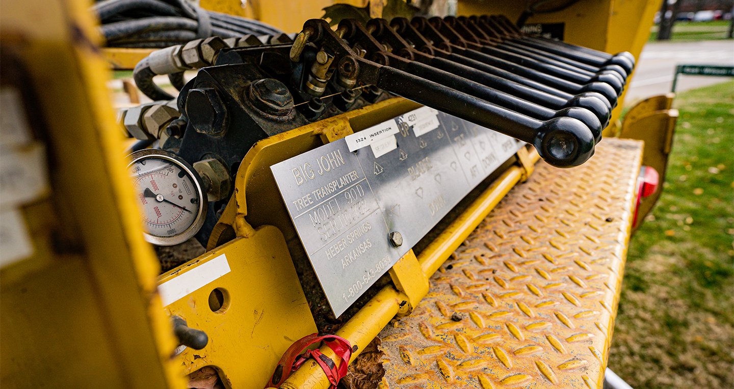 Closeup image of the shifter controls of the large, Big John tree planter truck