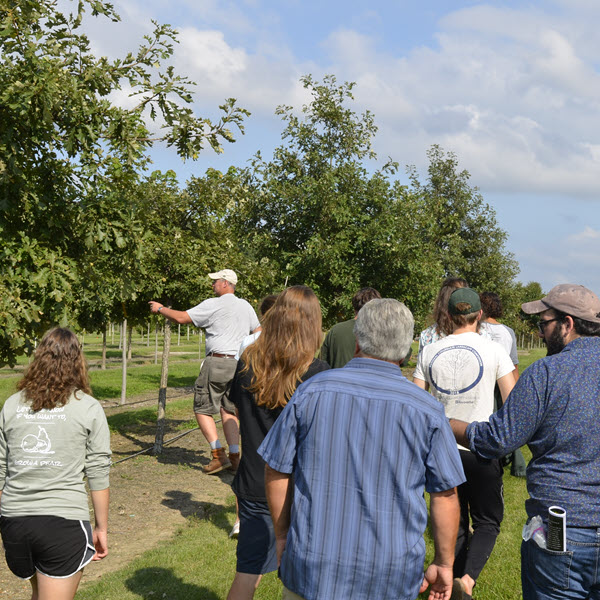 Beaumont Nursery's Jay Andrews gives a group of Horticulture students a tour of the tree nursery