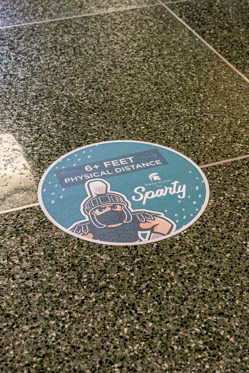 Example of floor decal to encourage physical distancing
