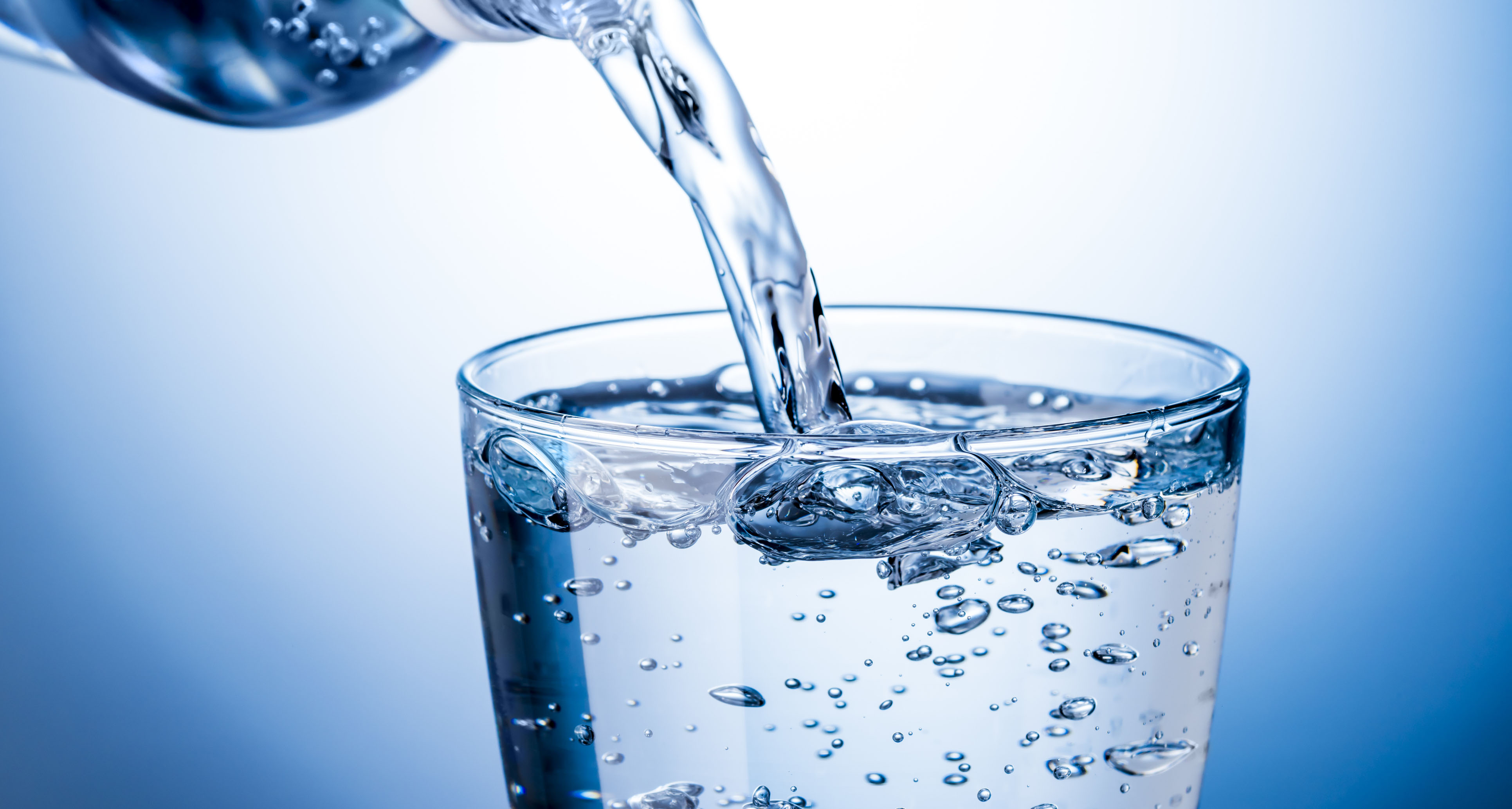 Water pouring into a glass