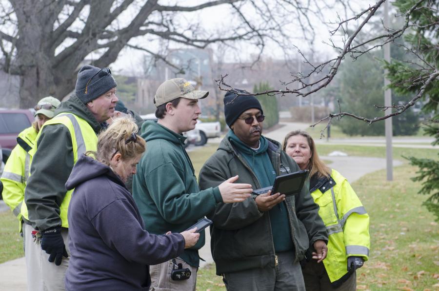 IPF workers with an Ipad.