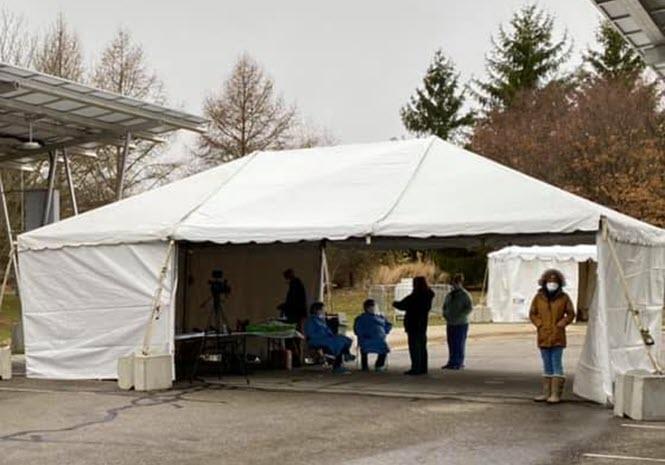 Photo of the drive-through COVID-19 testing tents at Parking Lot 100 on the MSU campus.
