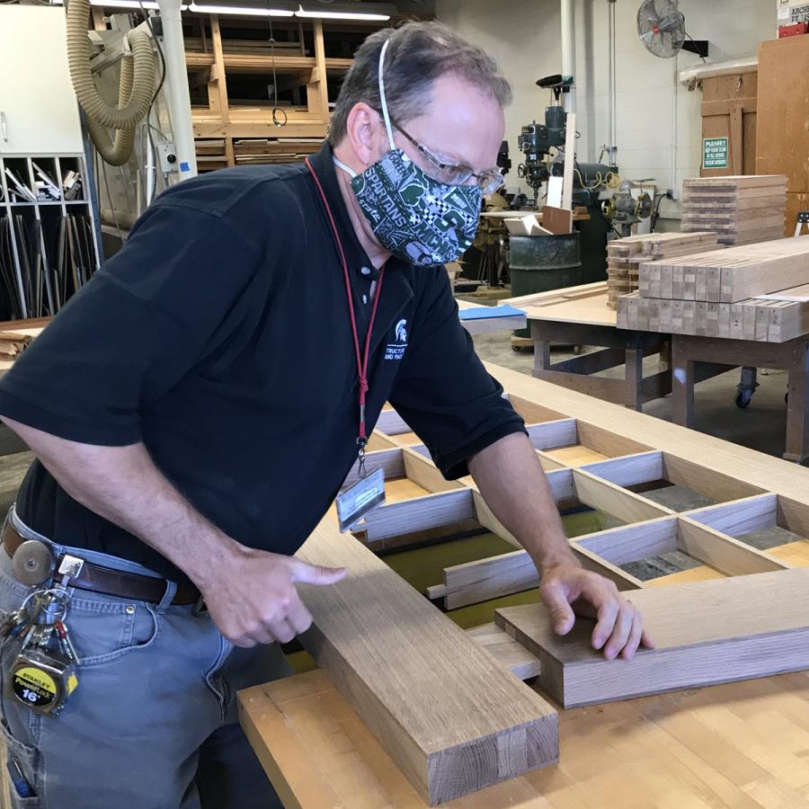 IPF carpenter Steve Rondeau assembles one of the replacement doors for the Auditorium 