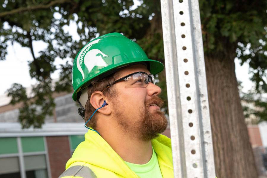 Employee wearing personal protective equipment