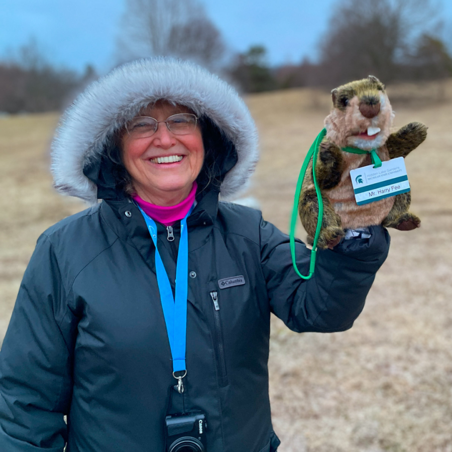 Club President, Julie Hewlett, with HLG resident groundhog, Mr. Harry Fee.