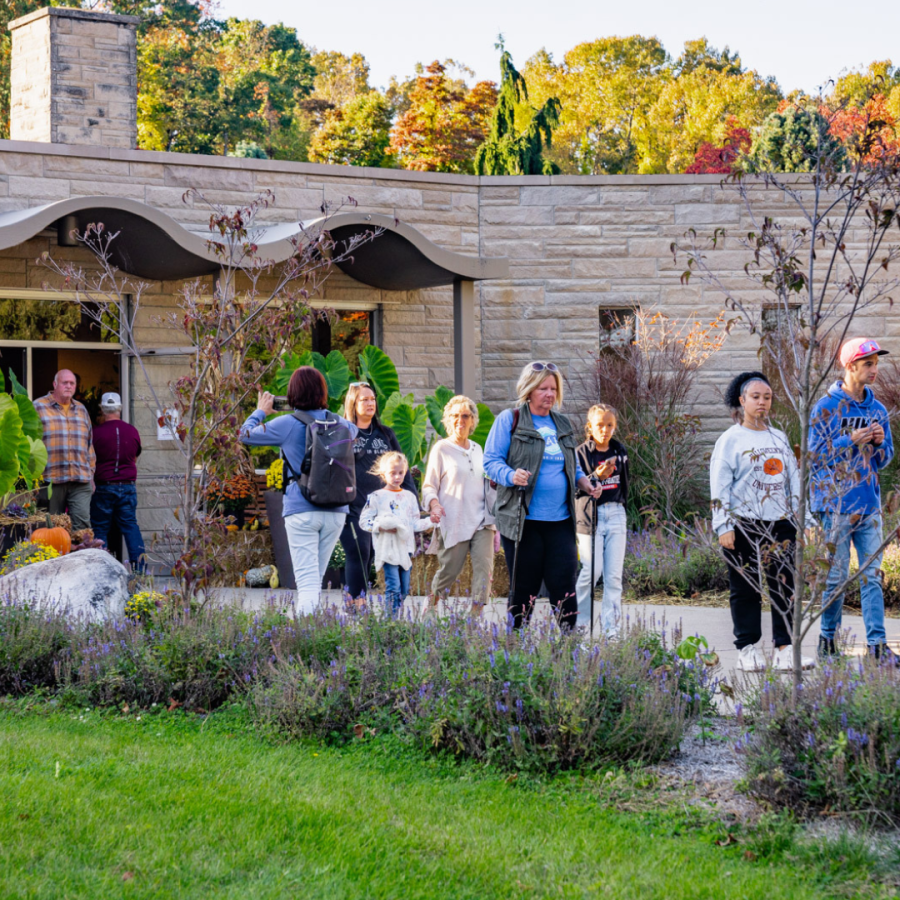 Visitors walking outside the Conservatory.