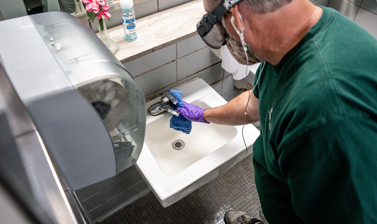 IPF custodian cleaning MSU spaces