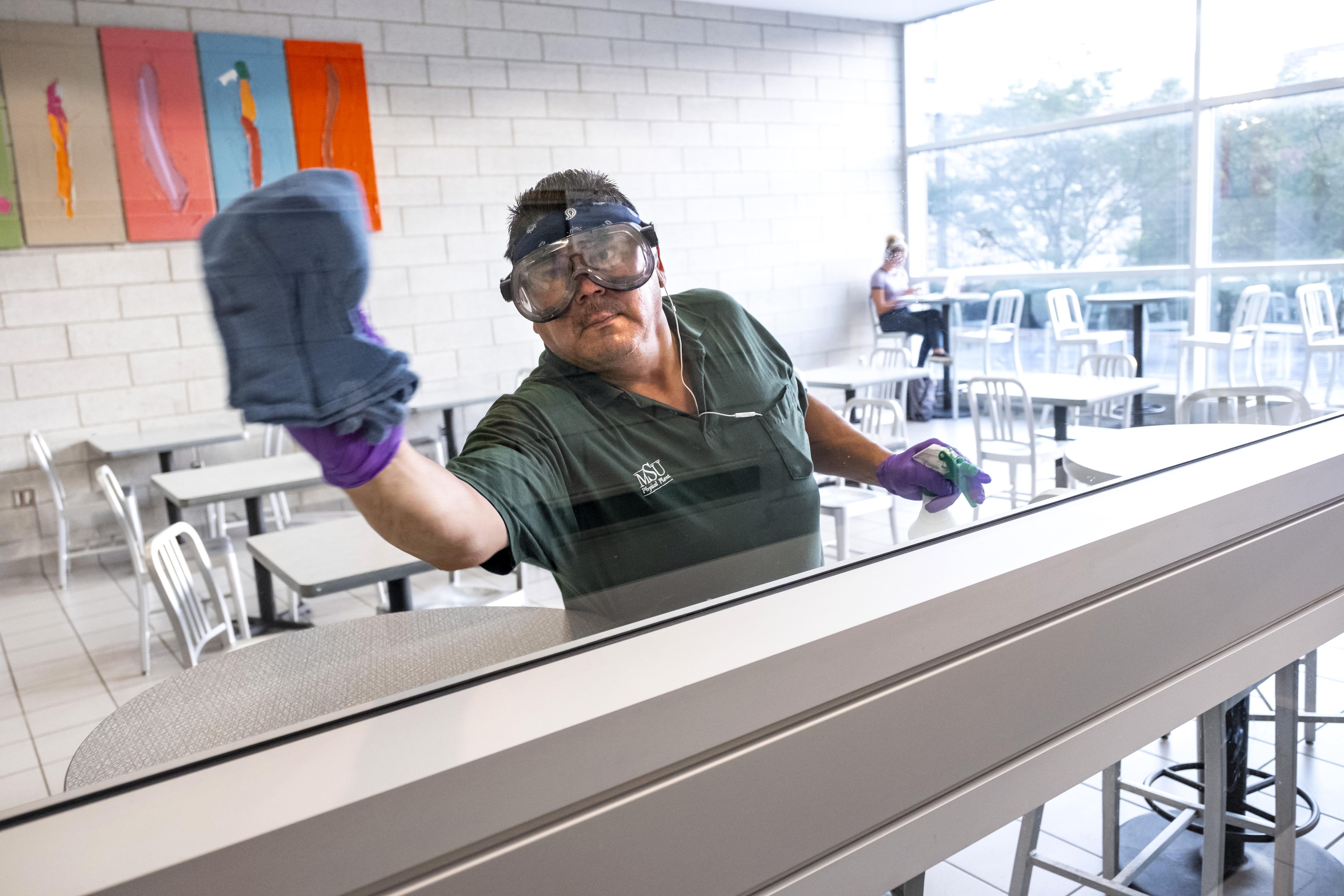 IPF custodian cleaning MSU academic spaces