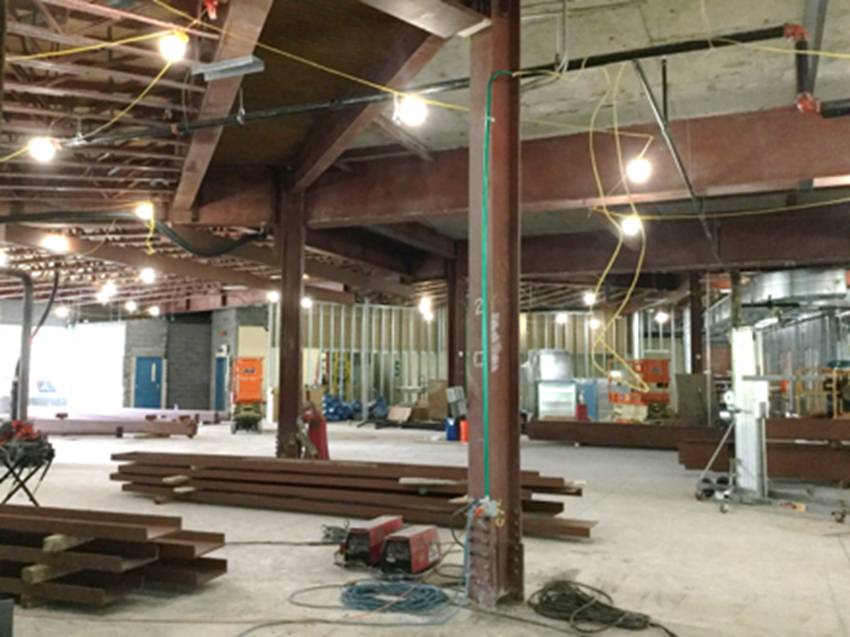 Newly installed steel columns and beams on the second floor