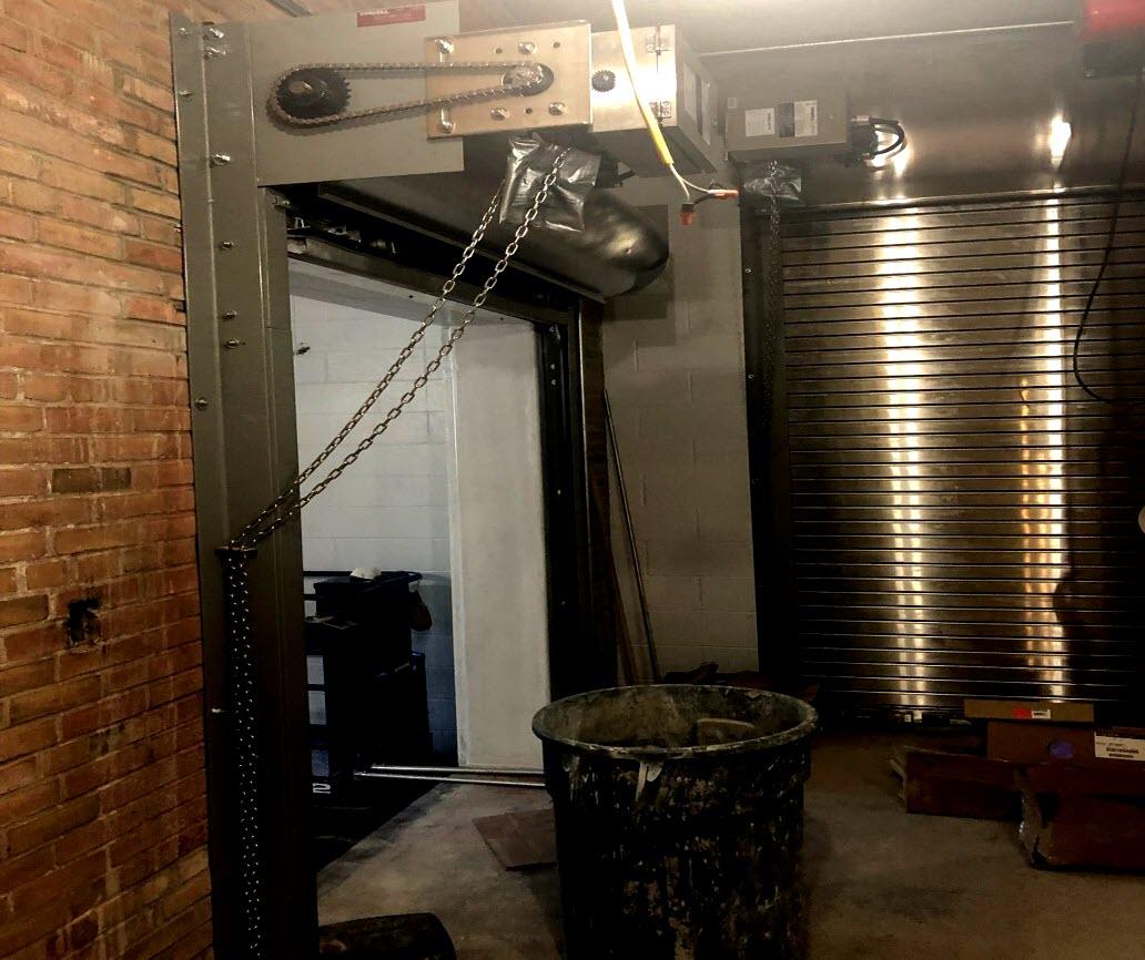 photo of equipment wash area overhead door