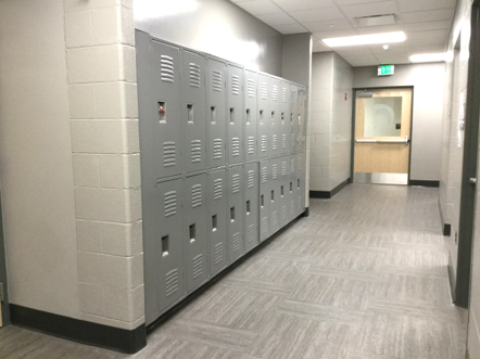 New general-purpose lockers in main corridor, which separates locker rooms