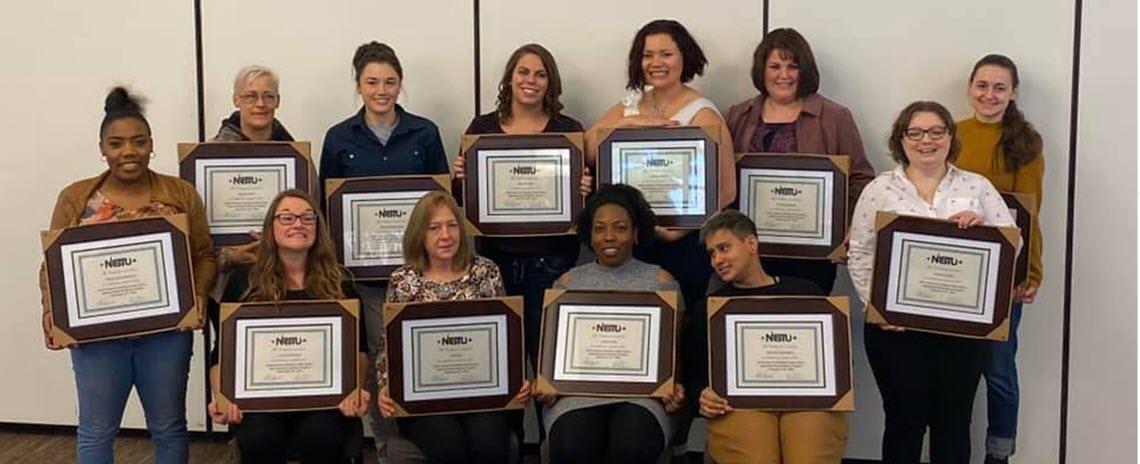 Photo of fall graduating WIST cohort with their certificates