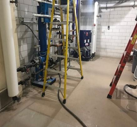 New basement Mechanical Room - new semi-instantaneous water heater and condensate receiver. Room will also house clean steam generator.