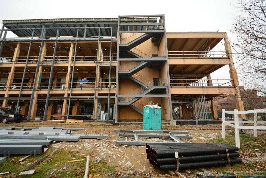 View from West Shaw Lane showing the south stair tower surrounded in mass timber 
