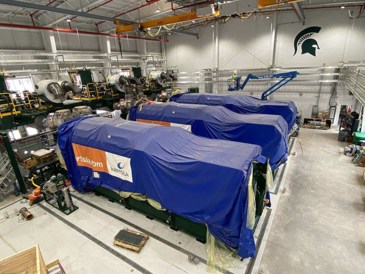 Interior of the R.I.C.E. facility showing the three engines installed on their pads