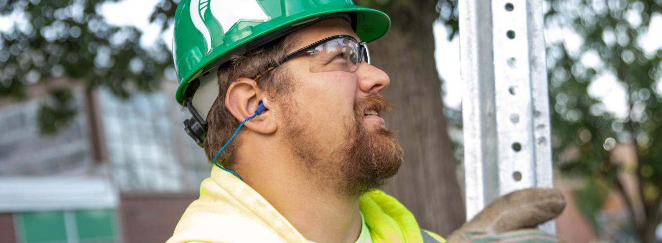 Employee wearing personal protective equipment