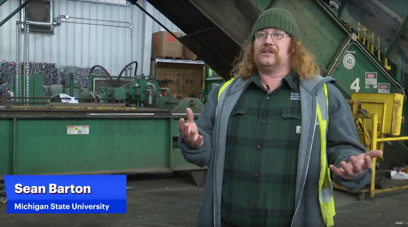 Sean Barton stands in the MSU Recycling Center