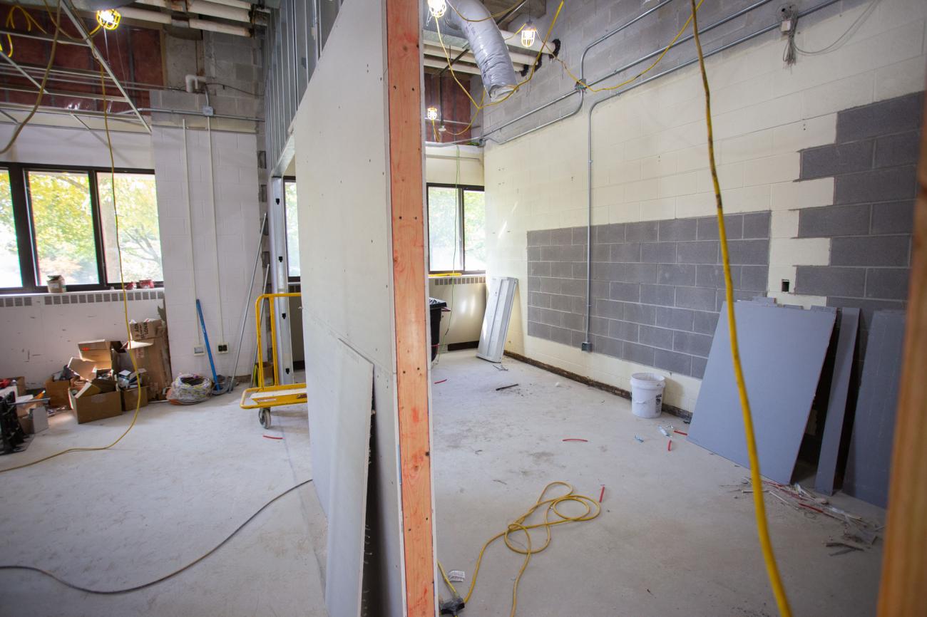 In-progress construction photo with new cinder block walls, metal framing and drywall