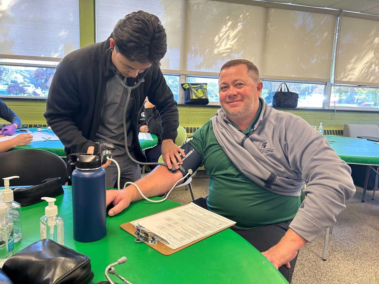 Matt Bailey gets his blood pressure checked at the LS health fair