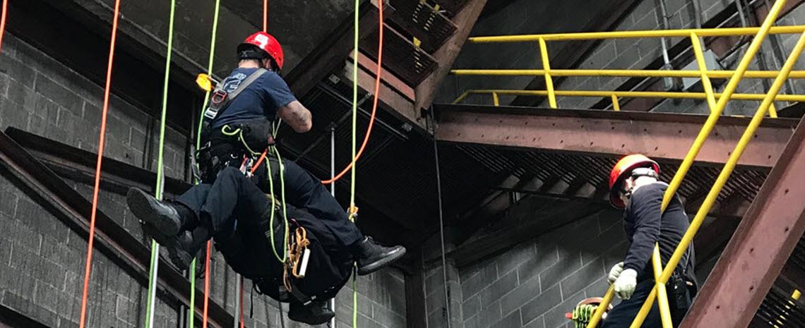 Local firefighters practicing rope climbing at the TB Simon Power Plant Transfer Tower