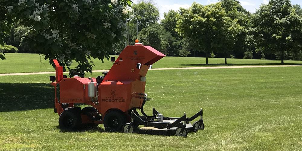 Photo of mowing robot at work