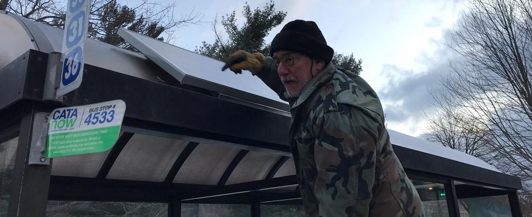 IPF's Don Meyers helps fabricate brackets to install solar panels at CATA bus shelter