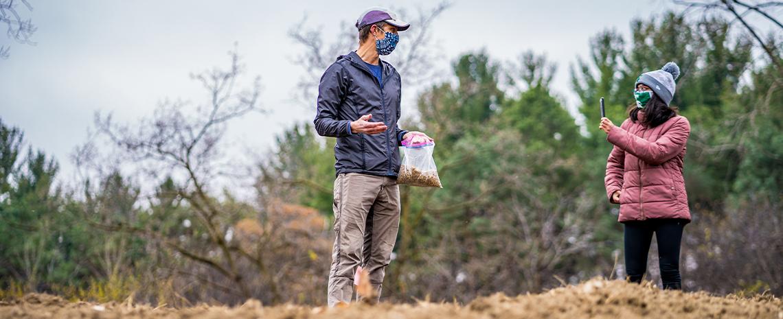 Prof. Lars Brudvig hosts live video chat while seeding prairie area