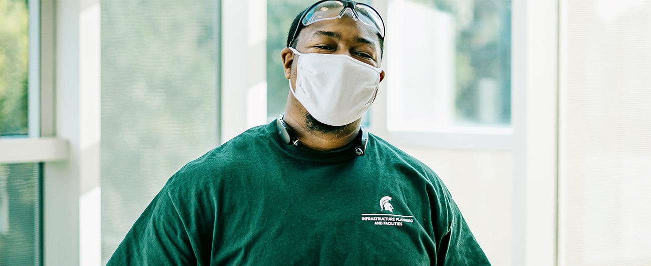 MSU Custodial Services employee posing