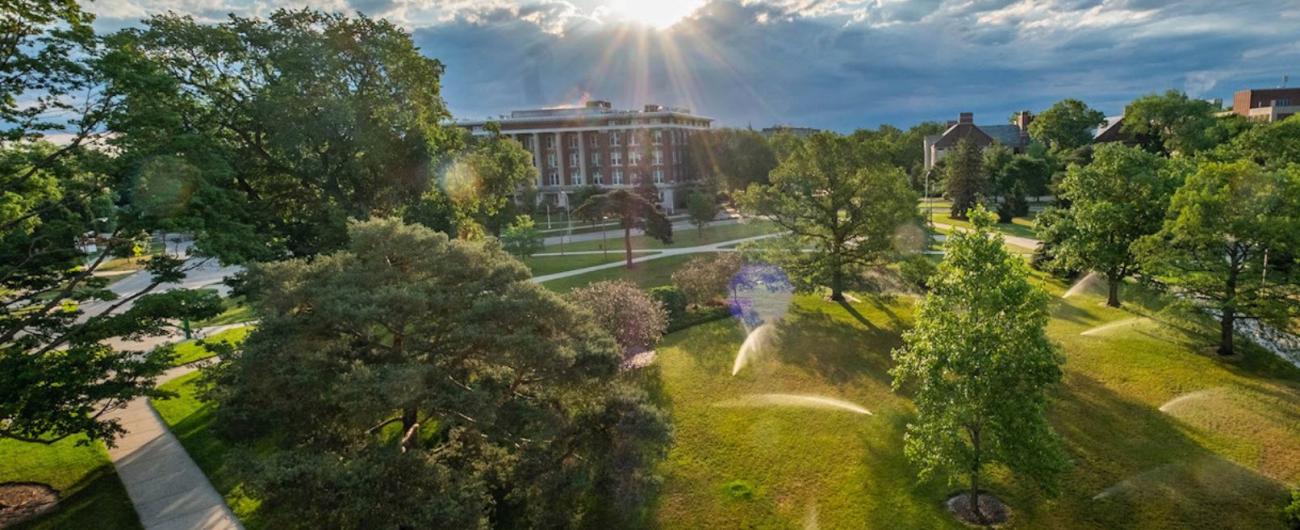 Aerial photo of MSU campus with trees and walking paths